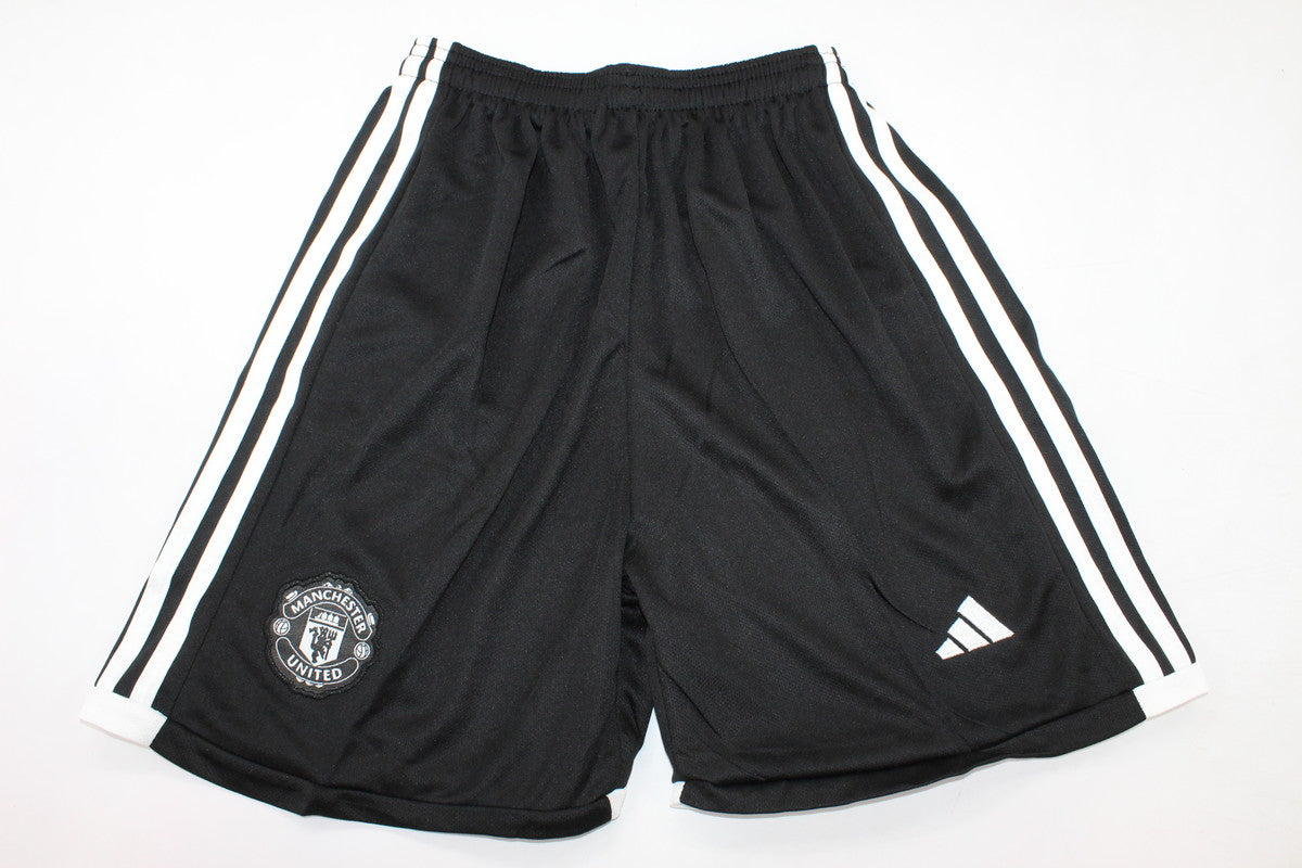 Kit de niño Manchester United visitante 23/24