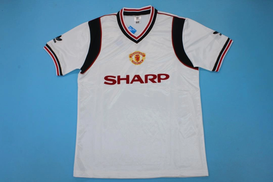 Retro-Clubes-Manchester-United-84-86-visitante-portada Manchester United retro 84/86 visitante - Imagen 1