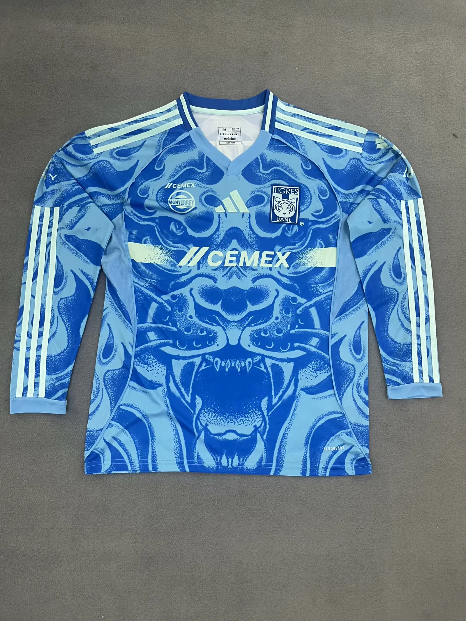 Clubes26-Tigres-visitante-manga-larga-portada Tigres visitante manga larga 25/26 - Imagen 1