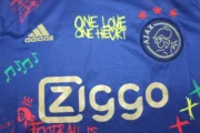 Ajax retro 21/22 Bob Marley azul - Imagen 10