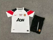 Kit de niño Manchester United retro 10/11 visitante