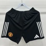 Short Manchester United local color negro 25/26 versión jugador