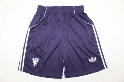 Short Manchester United visitante color azul 25/26