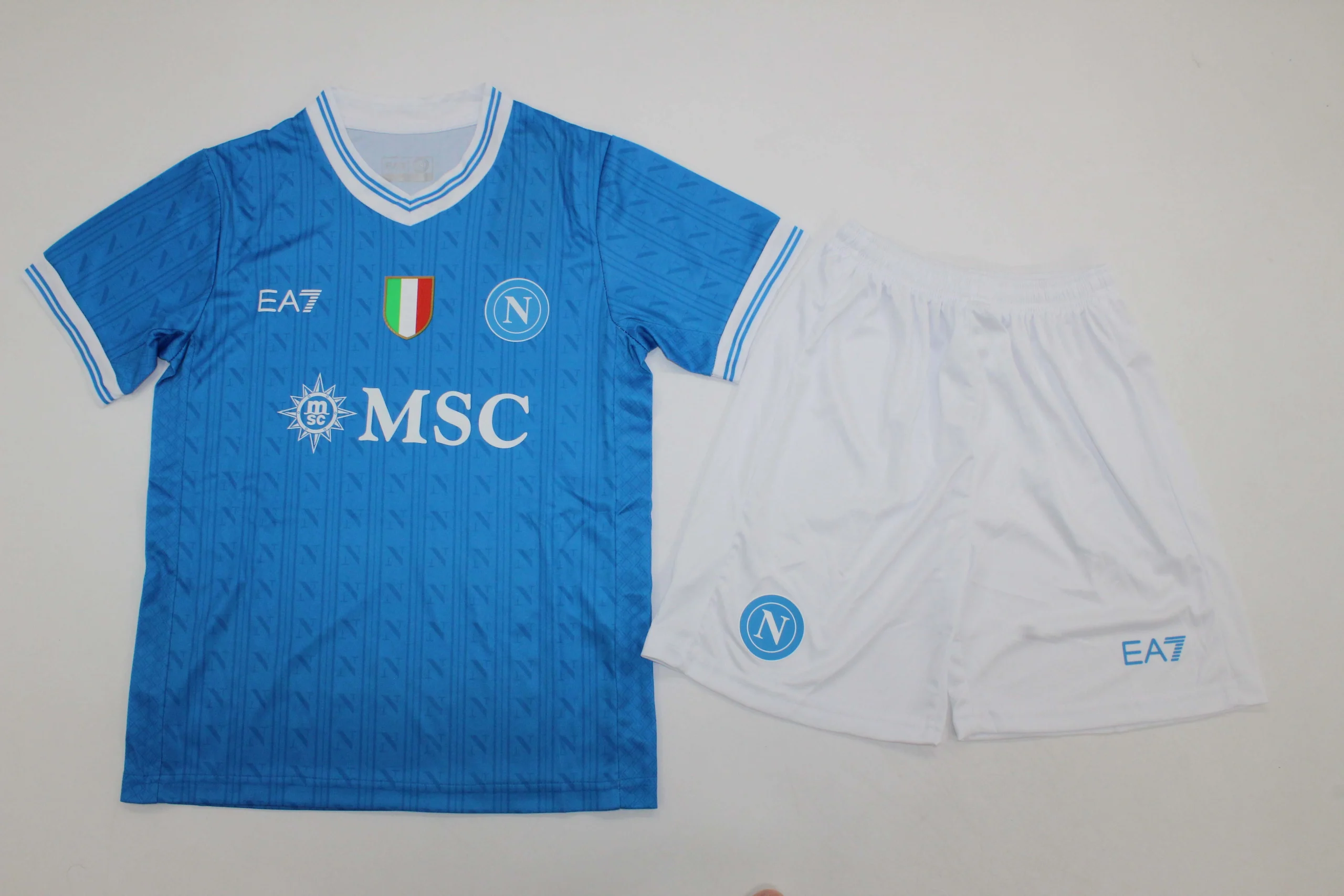 TallaNino26-Napoles-local-portada Kit de niño Nápoles local 25/26 - Imagen 1