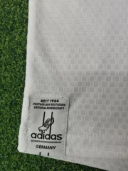 Kit de niño Alemania local 2026 versión jugador - Imagen 6