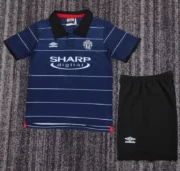 Kit de niño Manchester United retro 99/00 visitante