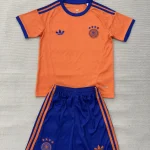 Kit de niño Alemania portero color naranja 2026