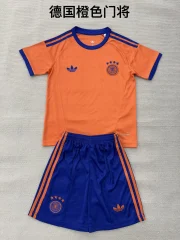 Kit de niño Alemania portero color naranja 2026